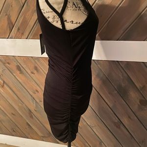 NWT FASHION NOVA Black ruched body con spandex dress